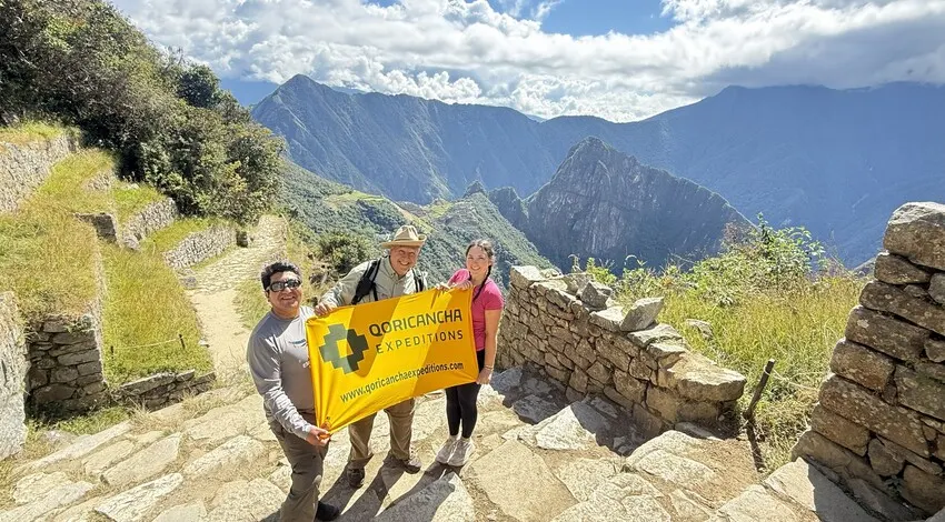 Short Inca Trail hikers at Sun Gate overlooking Machu Picchu