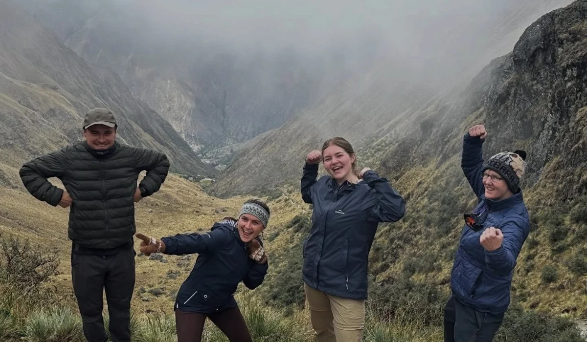 Happy trekkers celebrating on an alternative Peru hiking route