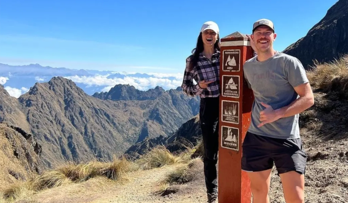 Tourists enjoying the Inca Trail at high costs