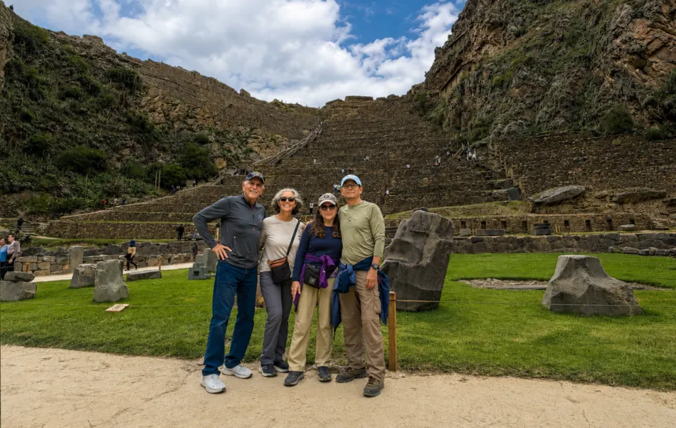 Clients exploring Ollantaytambo archaeological site in Cusco Peru