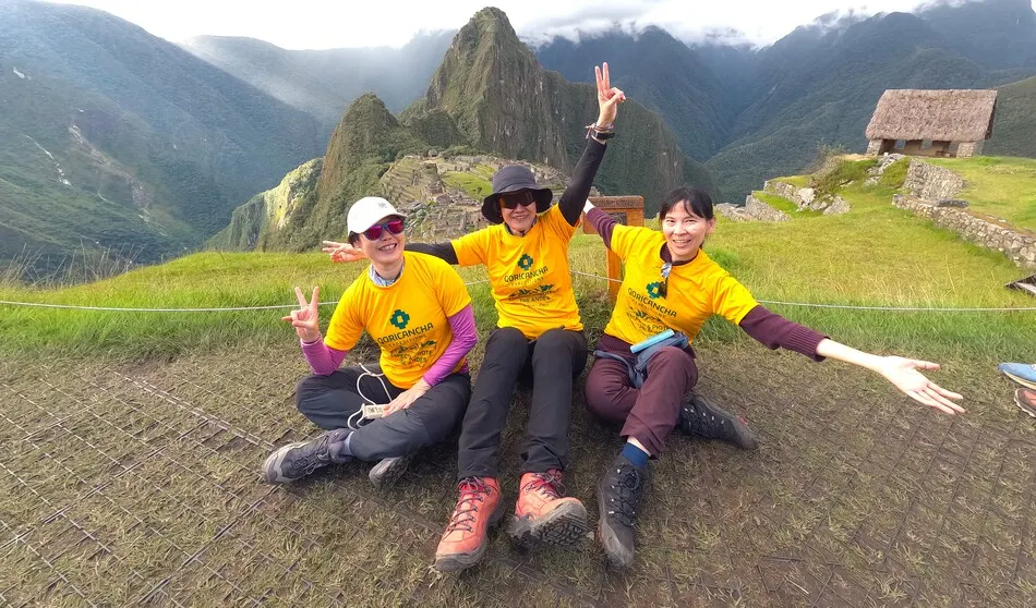 Travelers enjoying a guided tour of Machu Picchu with Qoricancha Expeditions