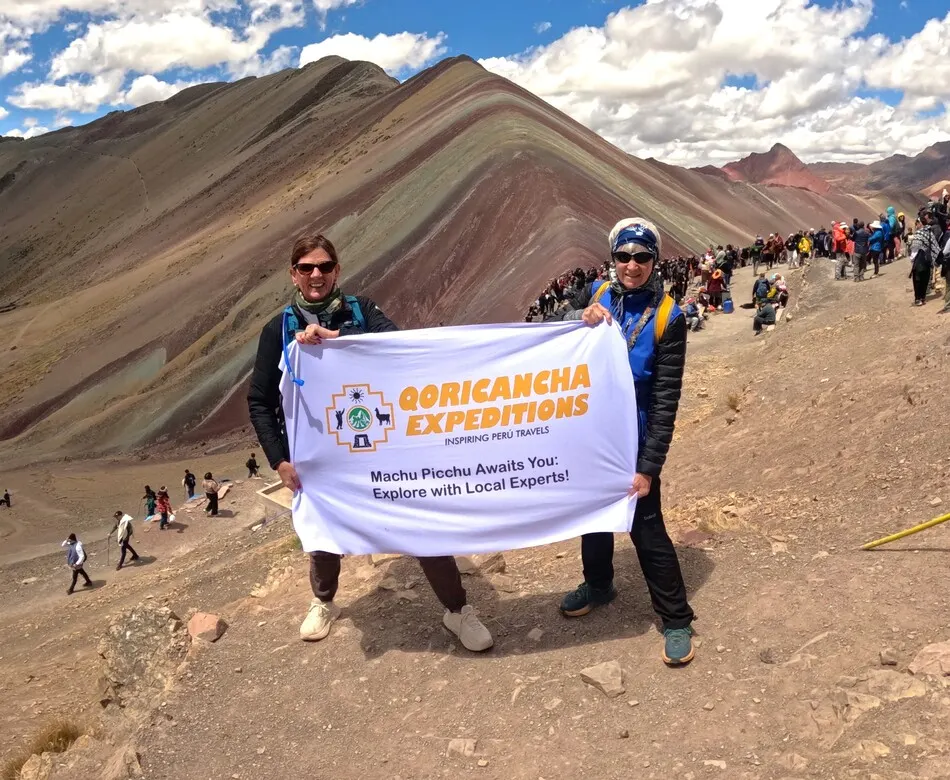 Our hikers admiring the stunning views at Rainbow Mountain Peru