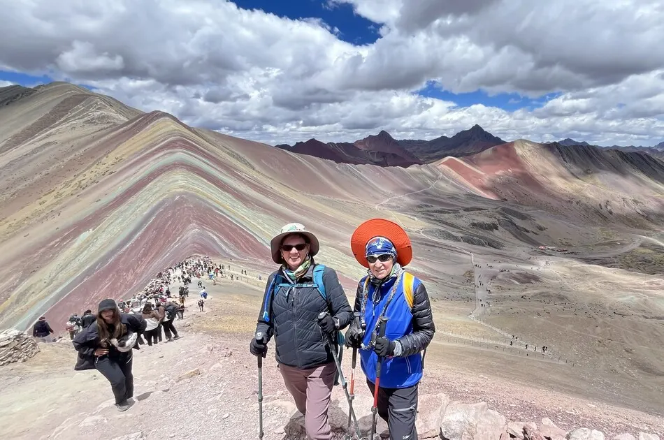 Our hikers admiring the colorful landscape of Rainbow Mountain Peru